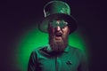 bearded man in green irish hat and funny eyeglasses screaming