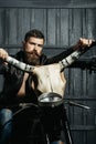 Bearded man hipster biker