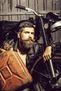 Bearded man hipster biker Royalty Free Stock Photo