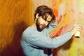 Bearded man or painter with beard with spray paint bottle Royalty Free Stock Photo