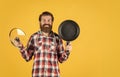 bearded man hold kitchen pan. brutal hipster cooking with saucepan. housekeep husband cook in pot. mature chef in Royalty Free Stock Photo