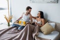 bearded man holding breakfast tray and Royalty Free Stock Photo