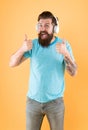 Bearded man listening music wireless gadget. Freedom going wireless offers you is unparalleled. Hipster happy using