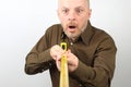 Bearded man makes a measuring tape measure centimeter Royalty Free Stock Photo