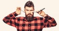 Bearded man, bearded male. Portrait of stylish man beard. Barber scissors and straight razor, barber shop. Vintage Royalty Free Stock Photo