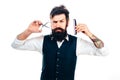 Bearded man, portrait of man with long beard and moustache. Barber comb and scissors for barber shop. Vintage barbershop