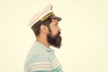 Bearded man profile portrait. Serious man wearing captain hat. Man profile face with beard and moustache