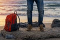 Bearded Man relaxing alone on the seaside on sunny day at sunset. Travel Lifestyle concept Royalty Free Stock Photo