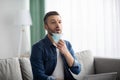 Bearded man removing face mask, lack of oxygen Royalty Free Stock Photo
