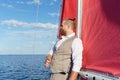 Man resting on a sailing boat Royalty Free Stock Photo