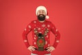 Bearded man santa hat red background. merry christmas. ready for xmas party. happy new year. cheerful hipster funny Royalty Free Stock Photo