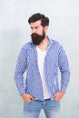 Bearded man seriously tuned. Denim look. Male casual fashion style. barber care for real men. brutal hipster with Royalty Free Stock Photo