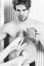 Caucasian bearded sexy macho holding coffee cup