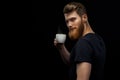 Bearded man is tasting coffee Royalty Free Stock Photo