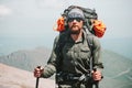 Bearded Man traveler hiking in mountains