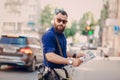 Bearded man travels with map