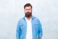 Bearded man trendy hipster style. Masculinity and male beauty concept. Hipster with beard and mustache wear denim shirt Royalty Free Stock Photo