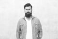 Bearded man trendy hipster style. Masculinity and male beauty concept. Hipster with beard and mustache wear denim shirt