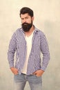 Bearded man trendy hipster style. Masculinity and male beauty concept. Hipster with beard and mustache wear shirt. Self Royalty Free Stock Photo