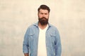 Bearded man trendy hipster style. Masculinity and male beauty concept. Hipster with beard and mustache wear denim shirt Royalty Free Stock Photo