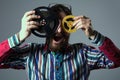 Bearded man with two 16mm film reel Royalty Free Stock Photo