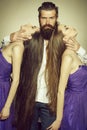 Bearded man and two women Royalty Free Stock Photo