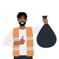 Bearded man in a vest holding a black plastic bin bag Royalty Free Stock Photo