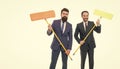 Bearded men formal suits hold mops. Big cleaning day. Cleaning business. Cleaning service concept. Cover our tracks