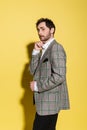 Bearded model in stylish plaid jacket