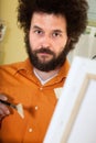 Bearded painter in his studio Royalty Free Stock Photo