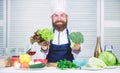 Bearded professional chef cooking healthy food. Healthy vegetarian recipe. I choose only healthy ingredients. Man cook