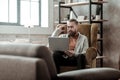 Bearded psychologist feeling concerned about his client