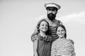 Bearded sailor with kids. father back home. family day. dad and daughters outdoor. ship captain welcome on board. small