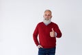 Bearded senior man giving thumb up gesture Royalty Free Stock Photo