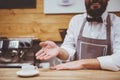 Bearded Smiling Male Barista.