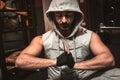 A bearded sporty man in the gym is meditating Royalty Free Stock Photo