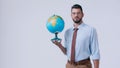 bearded teacher in eyeglasses holding globe