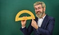 Bearded tutor at chalkboard. Teaching about angles. Mathematics for better future. Personal lesson. Mathematics and Royalty Free Stock Photo