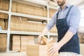 Packing Production Unit in Cardboard Box Royalty Free Stock Photo