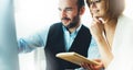 Bearded young businessman working on office. Director man thinking looking in monitor computer. Managers meeting. Idea, alalyze Royalty Free Stock Photo