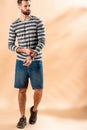 Bearded young man posing in striped sweatshirt Royalty Free Stock Photo