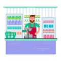 Beardy man working as cashier in shop or supermarket. Hipster re Royalty Free Stock Photo