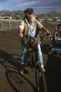 Beareded man on bicycle looks towards Pacific Ocean, Ventura Pier, Ventura, California, USA Royalty Free Stock Photo