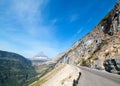 BEARHAT MOUNTAIN AT THE TOP OF LOGAN PASS ON THE GOING TO THE SUN HIGHWAY UNDER CIRRUS CLOUDS IN GLACIER NATIONAL PARK USA Royalty Free Stock Photo