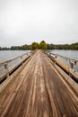 Bearskin Trailhead Bridge in Minocqua, Wisconsin over Lake Minocqua in September Royalty Free Stock Photo