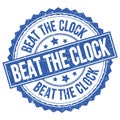 BEAT THE CLOCK text on blue round stamp sign