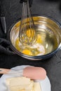 Beat egg whites and granulated sugar with an hand whisk Royalty Free Stock Photo