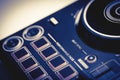 Beat Sync button and performance pad on a Digital DJ controller closed up