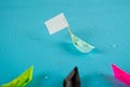 Beated paper ship with with flag Royalty Free Stock Photo