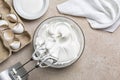 Beaten egg whites with sugar for Meringue in a mixing bowl Royalty Free Stock Photo